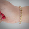 Video image preview for Finished Elongated Curb Bracelet in Sterling Silver 18K Yellow Gold Finish (5.80 mm - 11.70 mm)
