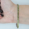 Video image preview for Tennis Bracelet with Peridot Colored CZ in Sterling Silver (2 mm - 4 mm)
