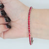 Video image preview for Tennis Bracelet with Ruby Colored CZ in Sterling Silver (3 mm - 4 mm)