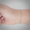 Video image preview for Finished Diamond Cut Round Bead Bracelet in 14K White Gold (1.20 mm - 1.90 mm)