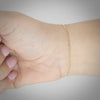 Video image preview for Finished Diamond Cut Round Bead Bracelet in 18K Yellow Gold (1.20 mm - 1.90 mm)